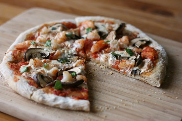 Homemade pizza with crispy crust on alickofsalt.com