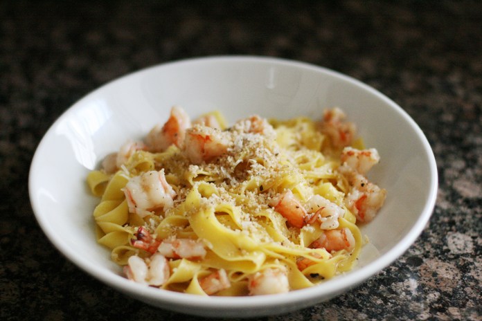 Shrimp pasta with parmesan and ground walnuts